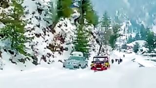 Car in snow beautiful village