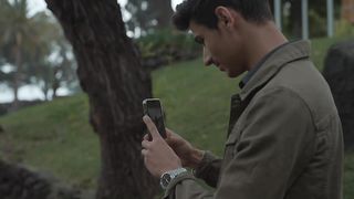 Guy taking pictures of her lover