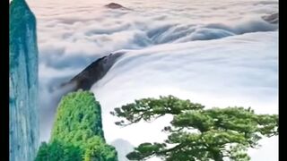 View of mountain in clouds feel music by calm