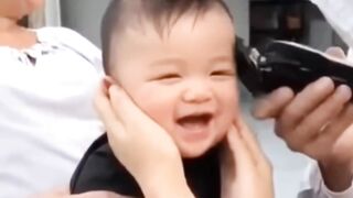 Baby enjoying his hair cut ????