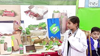 Student explaining her project