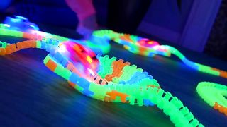 Ontel Magic Tracks 10 Foot Glow In The Dark Bendable Flexible Racetrack with LED Light-Up