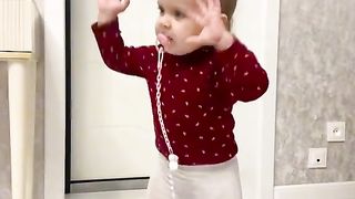 the baby is dancing.