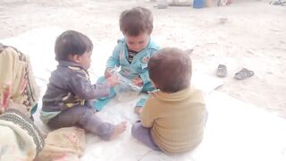 Lovely kids eating an playing