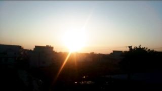 Beautiful. Sun  Rising In. Clouds.