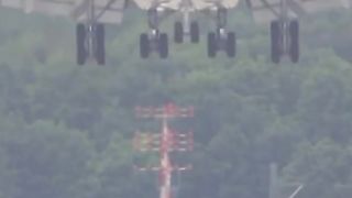 Airplane Boeing 747 landing in Storm