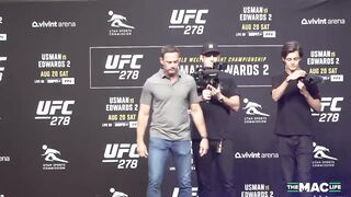 Leon Edwards grabs Kamaru Usman’s arm at UFC 278 face offs