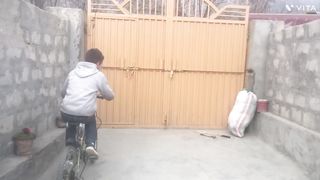 Young boy cycling tricks