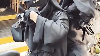Arabs on a motorcycle