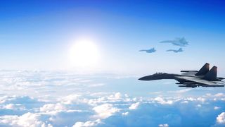 Group of Jet Fighter Flying High Above