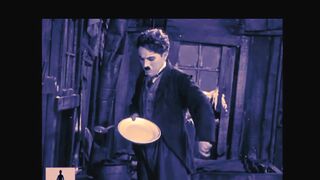 Charlie Chaplin Eating his shoe The Gold Rush
