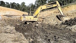 Alat berat buang lumpur