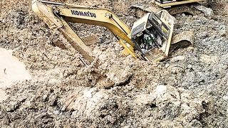 heavy excavator collapsed in the mud