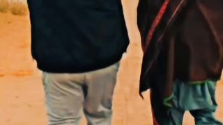 Me and my friend walk on the road