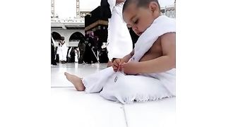 little cute baby perform umra