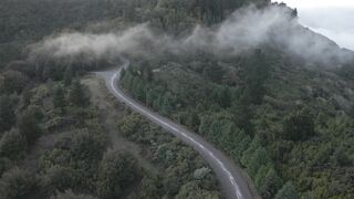 amazing view of clouds, forests, road
