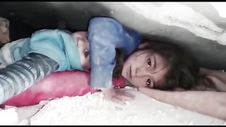 A little girl protect her brother