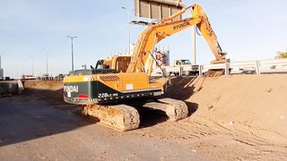 This man is doing a great job by using the excavator