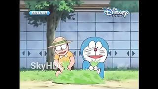 Doreamon cartoon cat and chick with cut grass