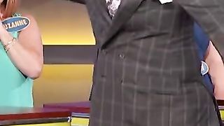 Steve Harvey clapping with man for nice answer