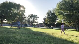 Kids Enjoy Playing and Running Around the Grass in Park