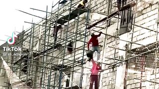Amazing skills construction workers.