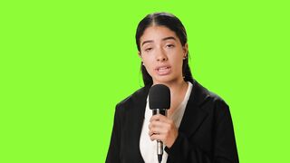 Female reporter reporting with microphone in hand on a chroma green background