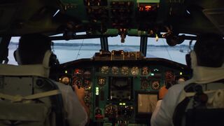 Pilots Landing Airplane