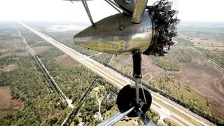 Retro airplane in flight