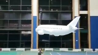 This plane was made by two employees of Wondros using the paper wrappers from company