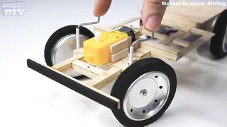 A tin with a small car