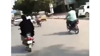 Chacha bike ride on road with wife #febspot