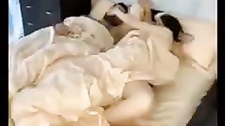 Husbent and wife in the bed