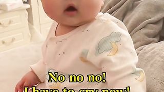 Cute baby Mom just push