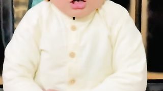 Cute Baby reciting Quran Pak