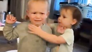 baby-girl-comforts-baby-boy