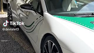 Dubai  is police  car nice  very best car enjoy