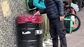 Looking at nothing in the bin