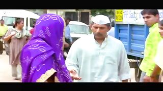 Rajpal Yadav in the market with a sari