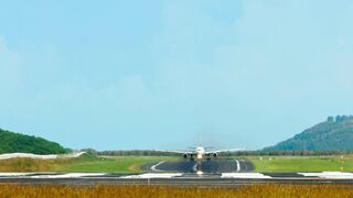 Airplane take-off,  International Phuket Airport, Thailand