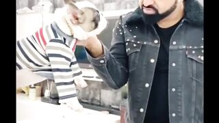 Dog Plying with Boy