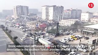 Drone footage show collapsed buildings,
