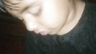 The baby girl is sleeping and drinking milk