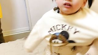 This littel girl is very hard work