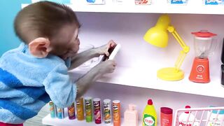 Monkey Baby Bon Bon washes dishes in the kitchen and Cooking chocolate for the puppy