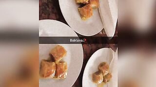 Having dinner and eating baklava
