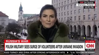 Polish teachers, farmers, bankers are joining the military. Here's why