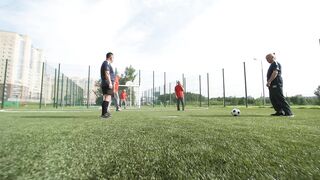 Look at old men playing football, sport