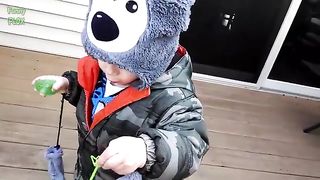 cute babies playing with bubbles