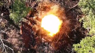 ⁣Ukraine drone dropped munitions two Russian armored vehicles one a BTR 82A suffer damage